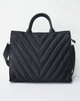Carmen Puffer Tote interior showing two slip pockets and zippered pocket